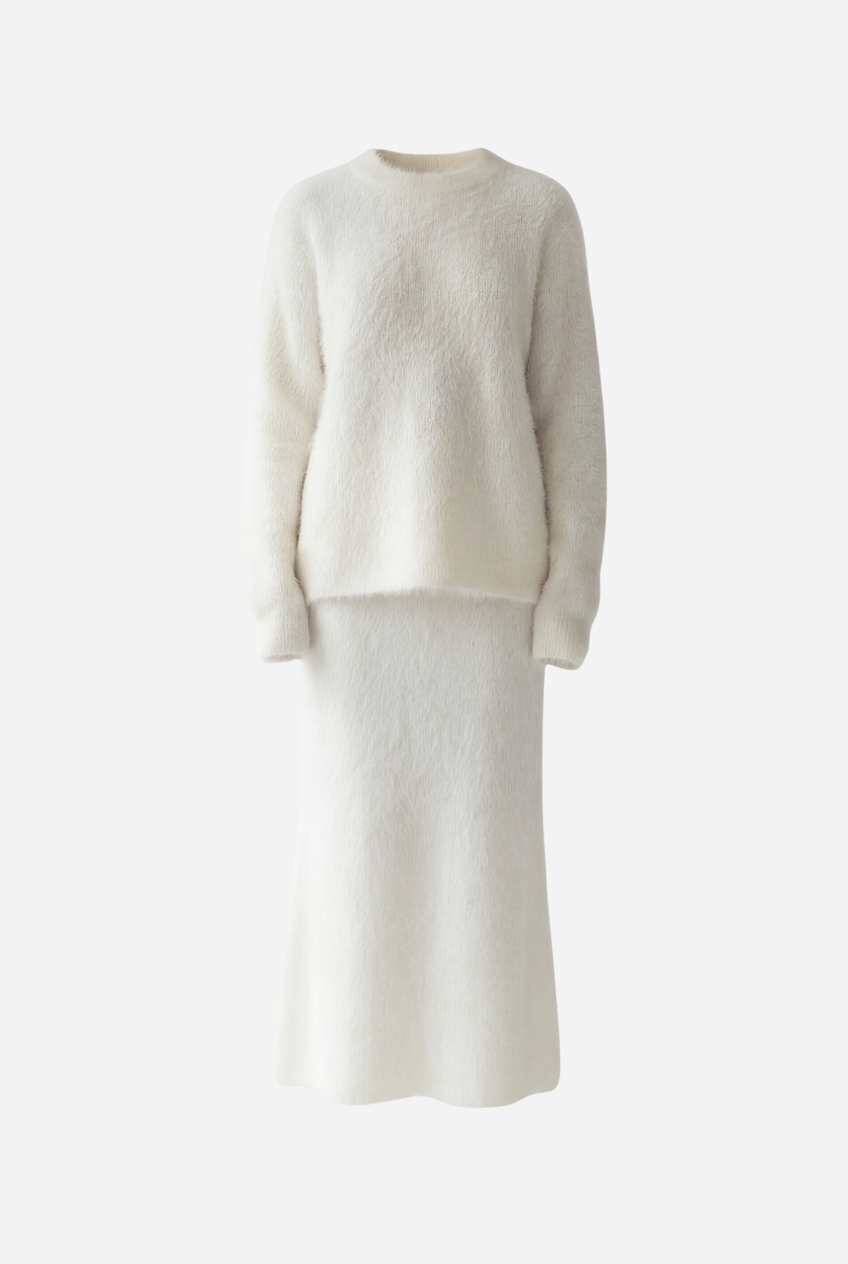 Ilgesnio silueto megztas komplektas