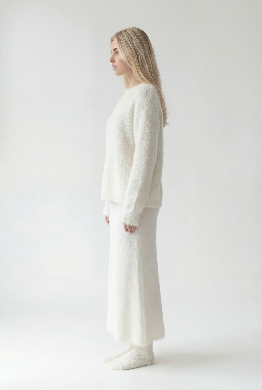 Ilgesnio silueto megztas komplektas